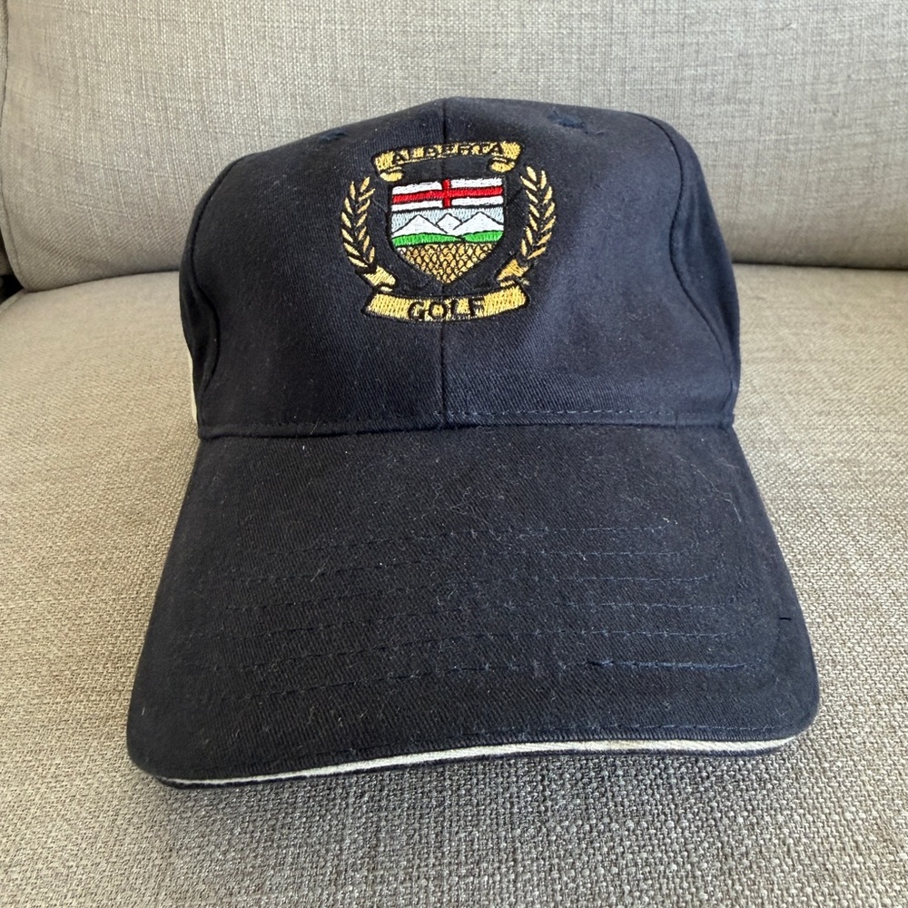 Black Golf Cap with Embroidered Crest